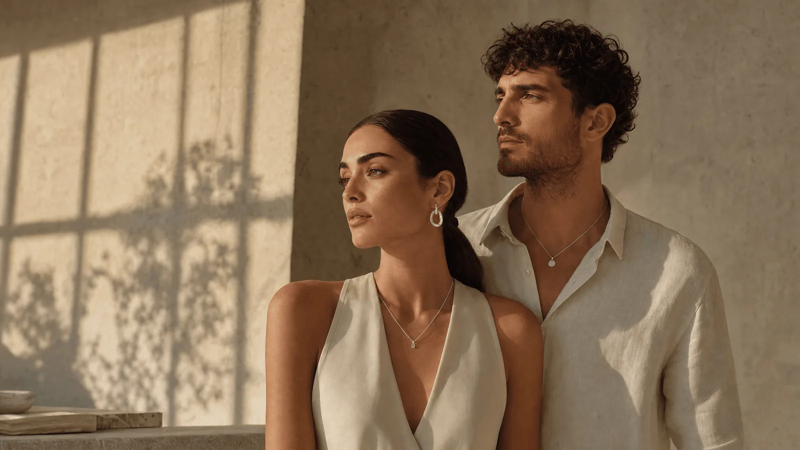 Two models wearing the Vesper jewelry collection